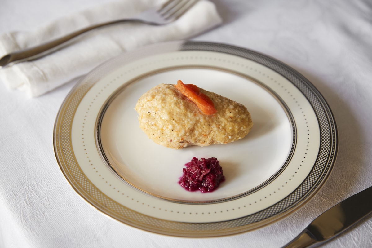Gefilte fish on white plate