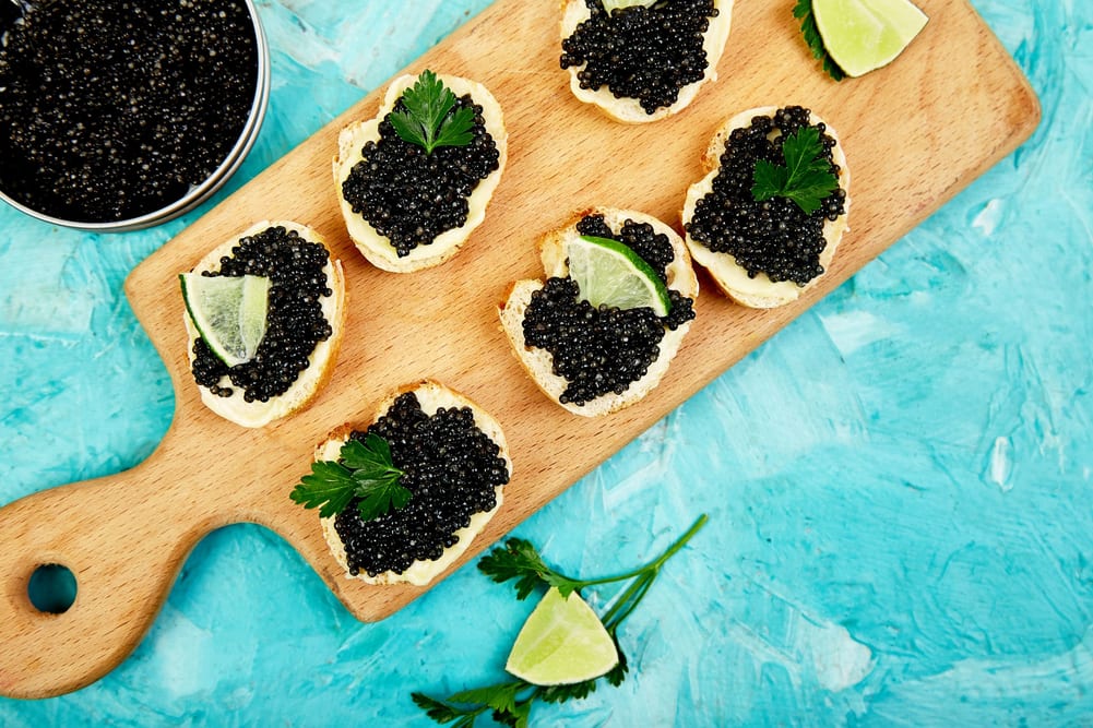 Sturgeon black caviar served on a crostini