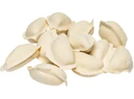 Raw varenyky dumplings scattered on white background