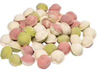 Colorful pink, green and white mini dumplings on white background